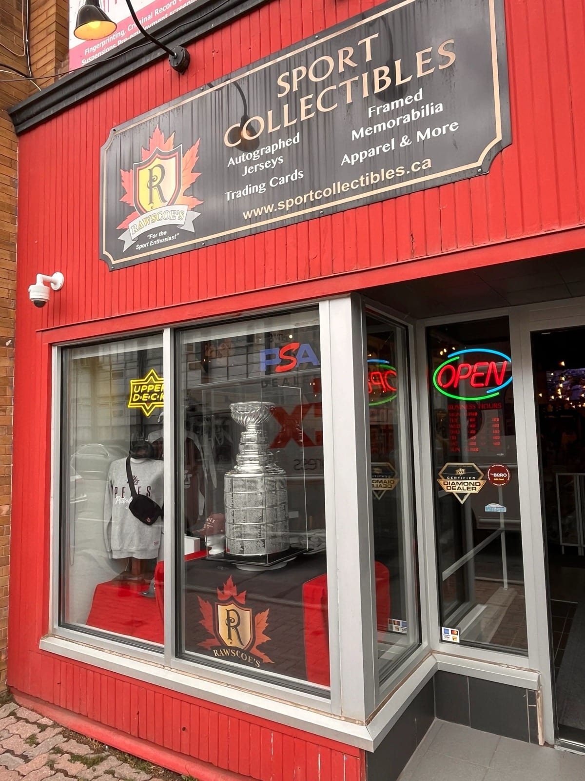 Sports collectibles storefront with security film on the display glass
